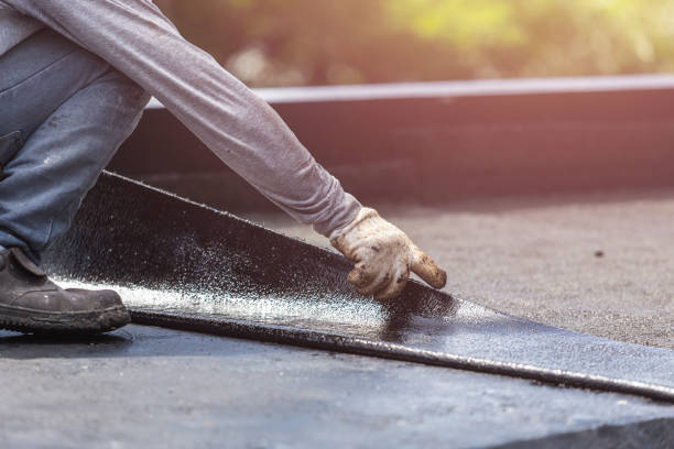 Professional Waterproofing technician working in Elkton, TN